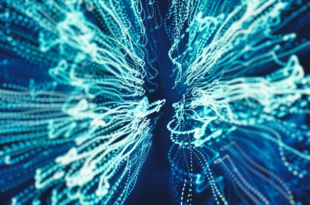 Captivating abstract image with vibrant blue light trails creating a dynamic visual effect.